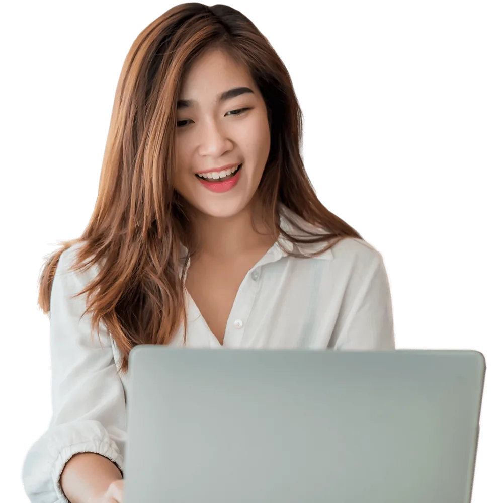 An office administrator running payroll in SMEasy on a laptop